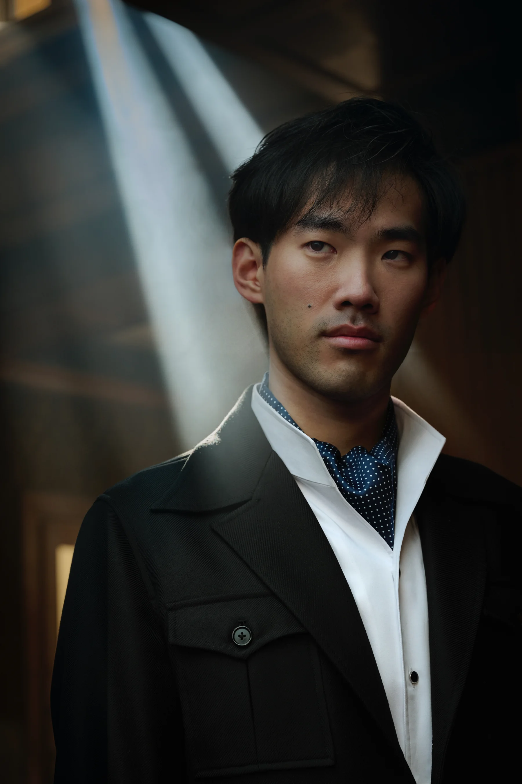 Portrait of Bruce Liu in a dark suit